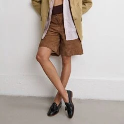 Mocassins à Bouts Ronds Et Pompons En Vernis Plissé Noir